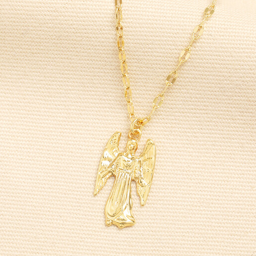 Vintage style gold necklace featuring a detailed angel pendant on a fine link chain