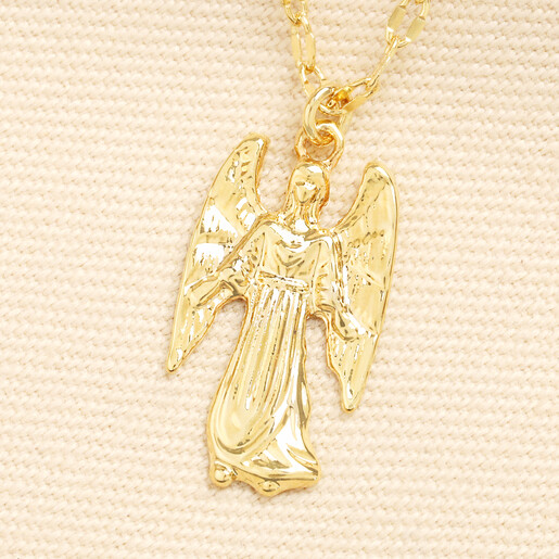 Close up of the gold angel pendant detailing intricate wings and draped robe