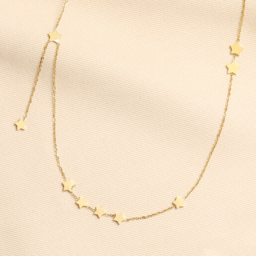 Gold stainless steel necklace with scattered star charms on a fine chain