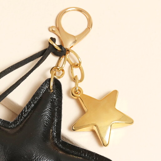 close up of gold bag charms 