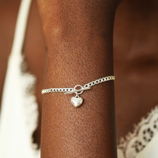 model shot of silver heart charm bracelet