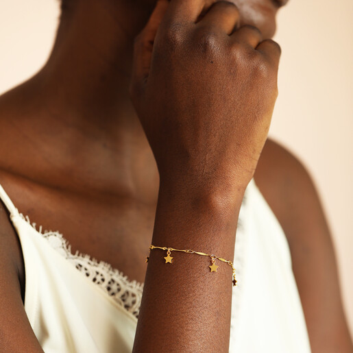 model shot of charm necklace in gold