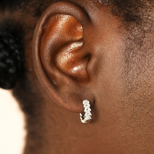 huggie hoop earrings on model
