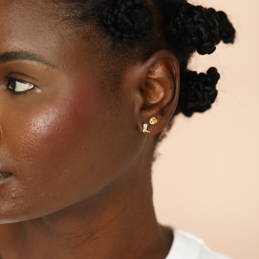 model shot of western-inspired earrings in gold