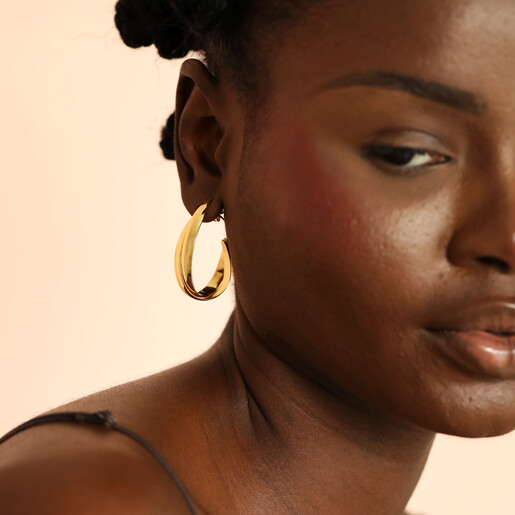 organic hoop earrings on model