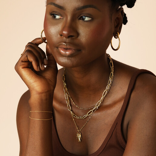 model shot of angel necklace in gold