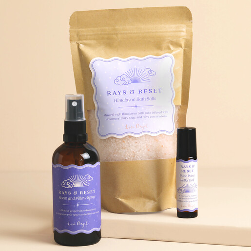Ray and Reset bath salts pouch alongside room spray and pulse point roller ball