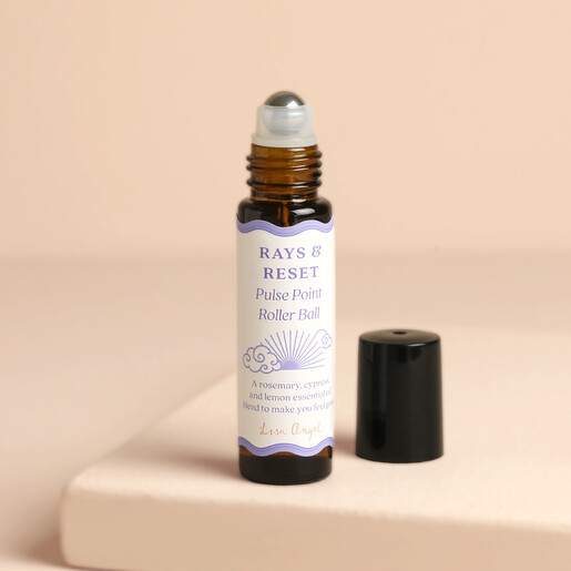 Ray and Reset pulse point roller ball with cap removed in amber glass bottle