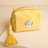 Front view of small yellow embroidered Beautiful Friend cosmetic pouch