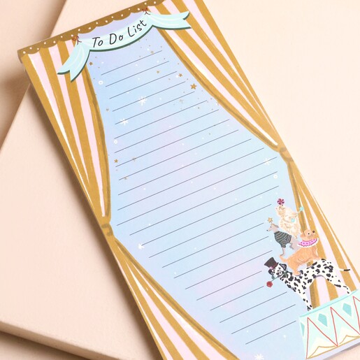 Close-up of circus dog notepad showing performing dogs and to do list heading