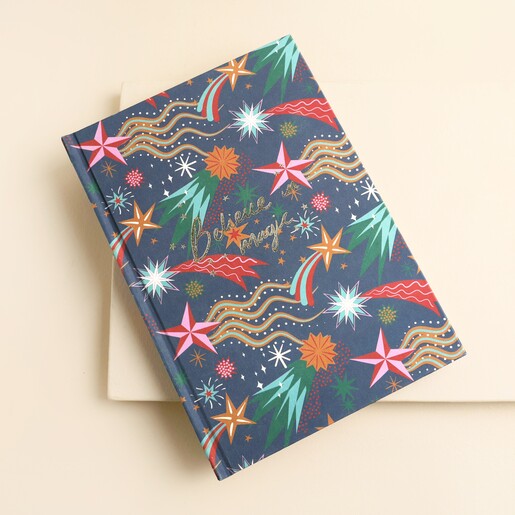 Large navy fabric notebook with colourful shooting stars and gold Believe in magic text