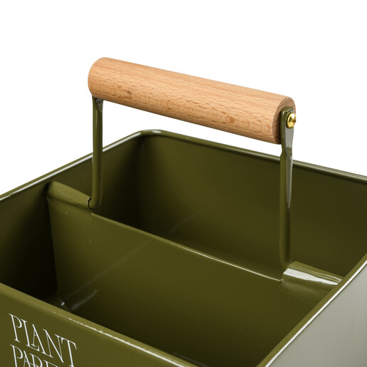 Close up of olive green metal storage caddy with wooden carry handle
