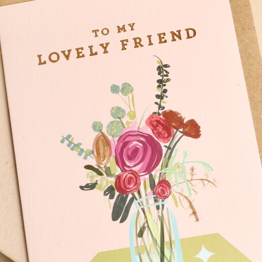 Close up of gold foil lettering and painted flowers on Cath Tate card
