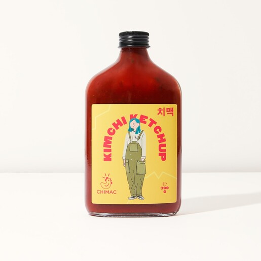 Front view of Chimac Kimchi Ketchup in a glass bottle with yellow illustrated label