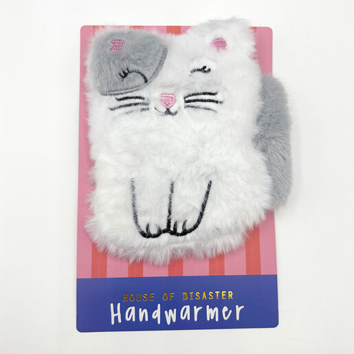 Plush cat hand warmer displayed on backing card packaging