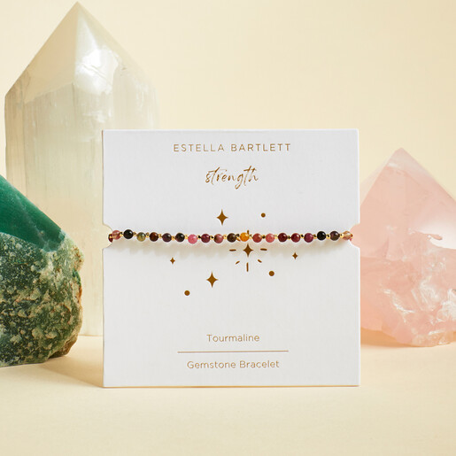 Estella Bartlett Strength mixed gemstone bracelet displayed on white presentation card