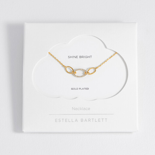 Estella Bartlett gold plated oval link necklace presented in a cloud gift card packet