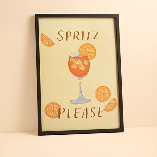 Spritz Please A3 poster print framed in black with an orange aperol drink illustration