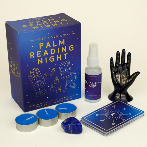 Complete palm reading kit including illustrated box, mist, cards, ceramic hand, and tealights