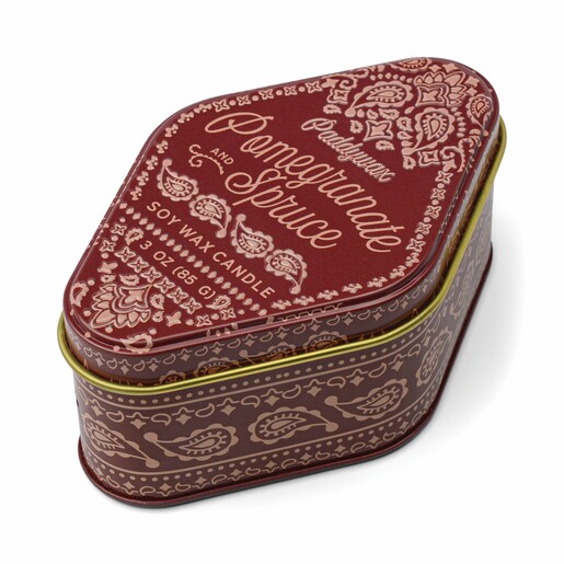 Paddywax Pomegranate and Spruce scented candle in a red paisley pattern tin