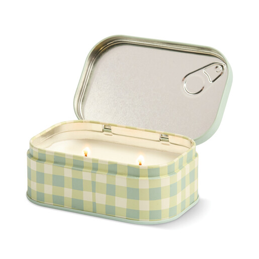Open Paddywax Macaron bistro tin candle lit with two burning wicks inside
