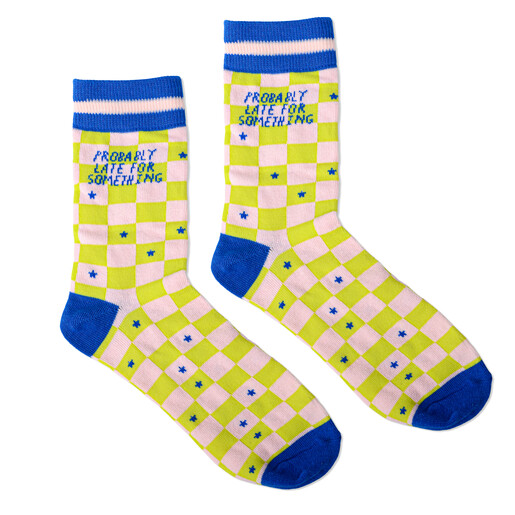 Pair of pink and green checkerboard crew socks with blue star details