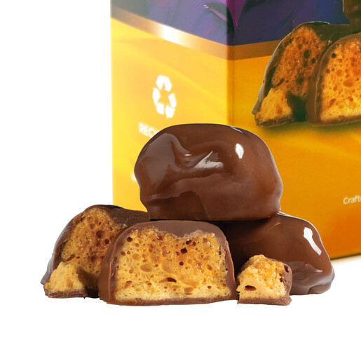 Close up of milk chocolate honeycomb bites showing crunchy interior