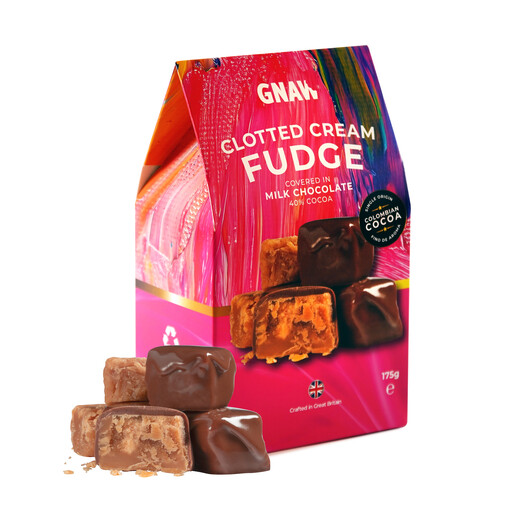 Gnaw milk chocolate clotted cream fudge bites in colourful packaging with fudge pieces