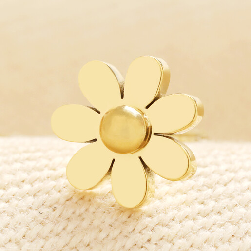 Detailed close-up of a gold stainless steel eight-petalled daisy stud earring.