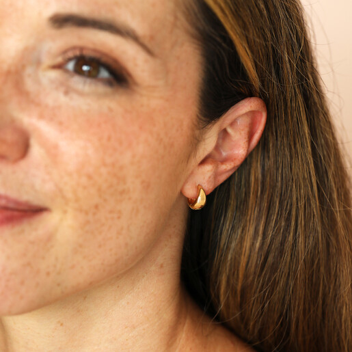 gold hoops on model