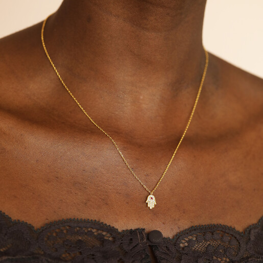 model shot of spiritual pendant necklace in gold