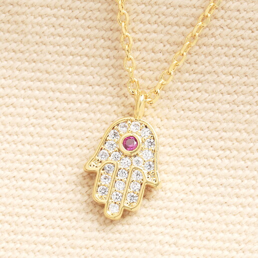 close up of hamsa hand pendant 