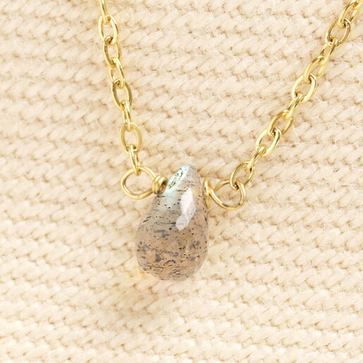 close up of semi-precious teardrop pendant