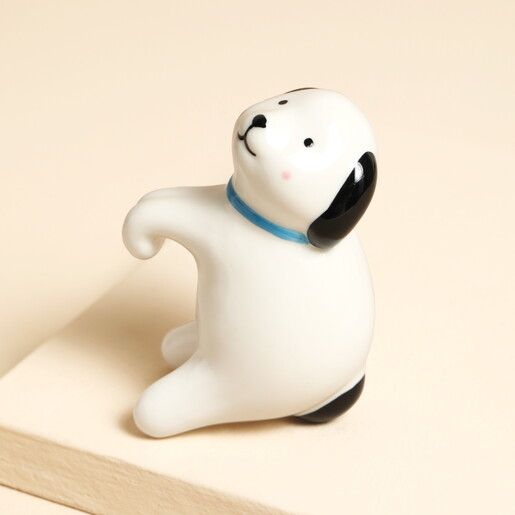 white ceramic dog planter hanger