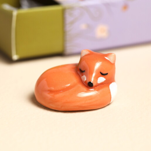 close up of ceramic fox token