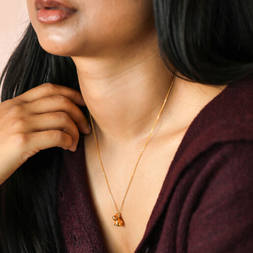 model shot of pendant necklace in gold