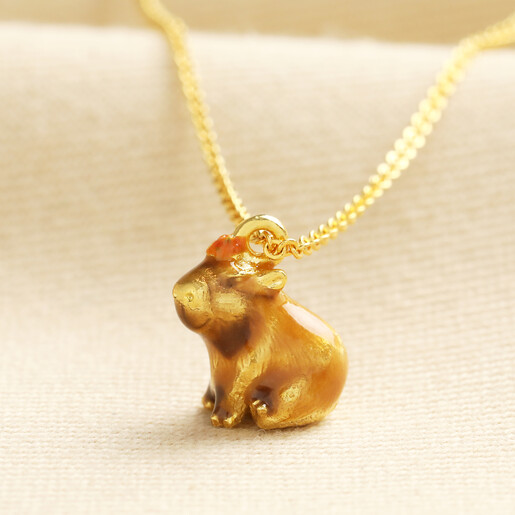 animal-themed necklace in gold