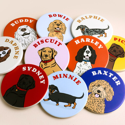 A cluster of colourful personalised ceramic dog coasters featuring various dog breeds