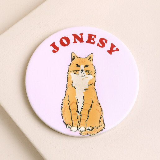 Personalised pink ceramic coaster with fluffy ginger cat illustration and name Jonesy