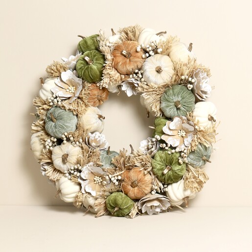 wreath against a pale pink background