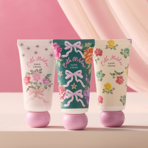 Three Cath Kidston hand cream tubes decorated with flowers and bows