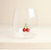 Close-up of the 3D glass red cherries inside the clear tumbler base