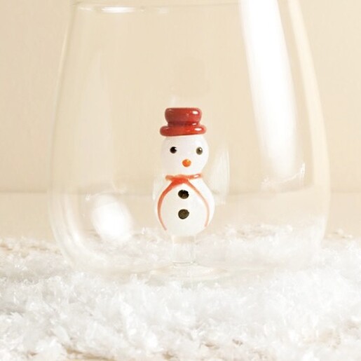 Close-up view of the 3D miniature glass snowman inside the tumbler