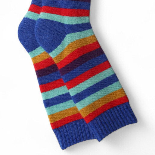 Close-up of Jess and Lou rainbow striped cosy wool socks for men.
