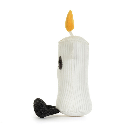 Side profile of Jellycat Flickerty Candle plush toy sitting upright