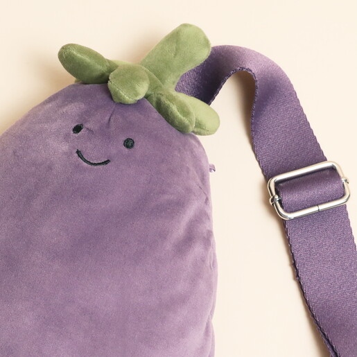 Close Up of Face and Strap of Plushie Bag in Purple