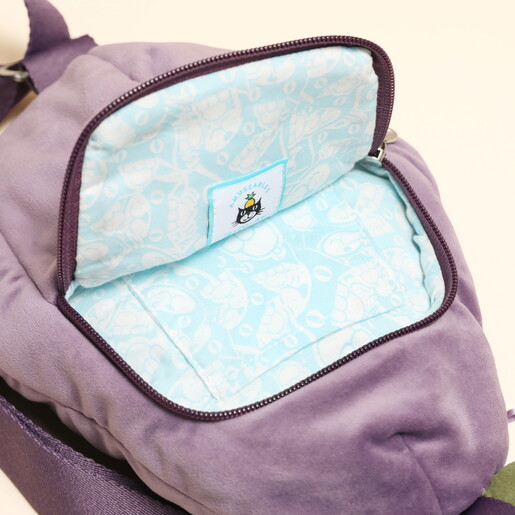 Close Up of Lined and Branded Compartment in Back of Jellycat Plushie Bag