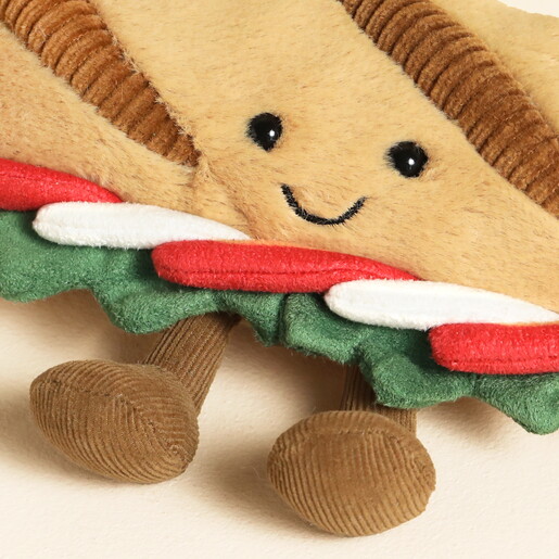 Close Up of Smiling Face on French Baguette Plushie