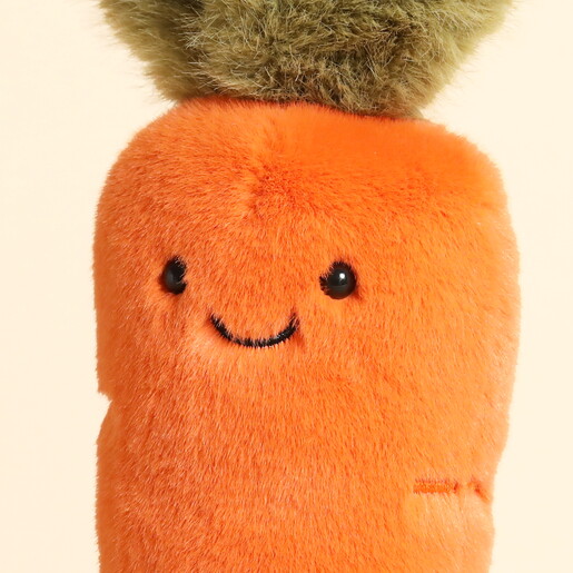 Close Up of Smiling Face on Carrot Plushie