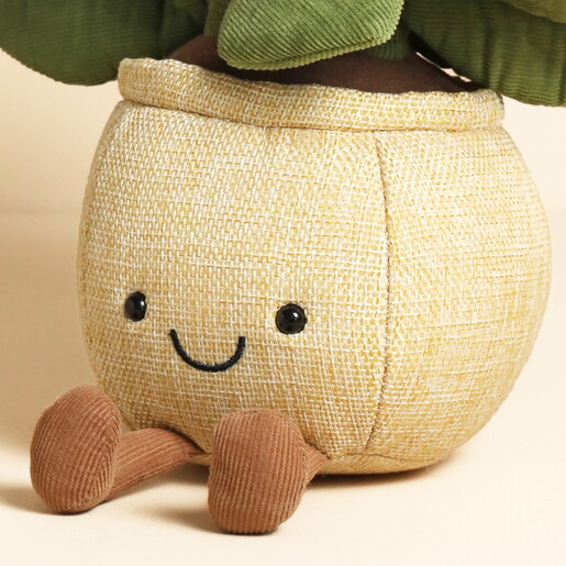 Close Up of Smiling Face on Pot of Jellycat Flower Plushie